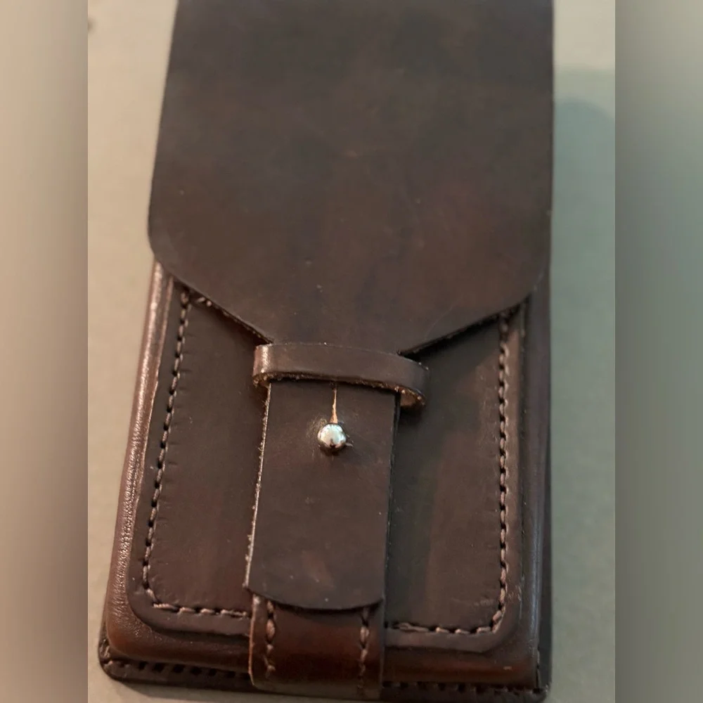 Handcrafted Brown Leather Phone Case, metal hardware, pre-owned but not used.